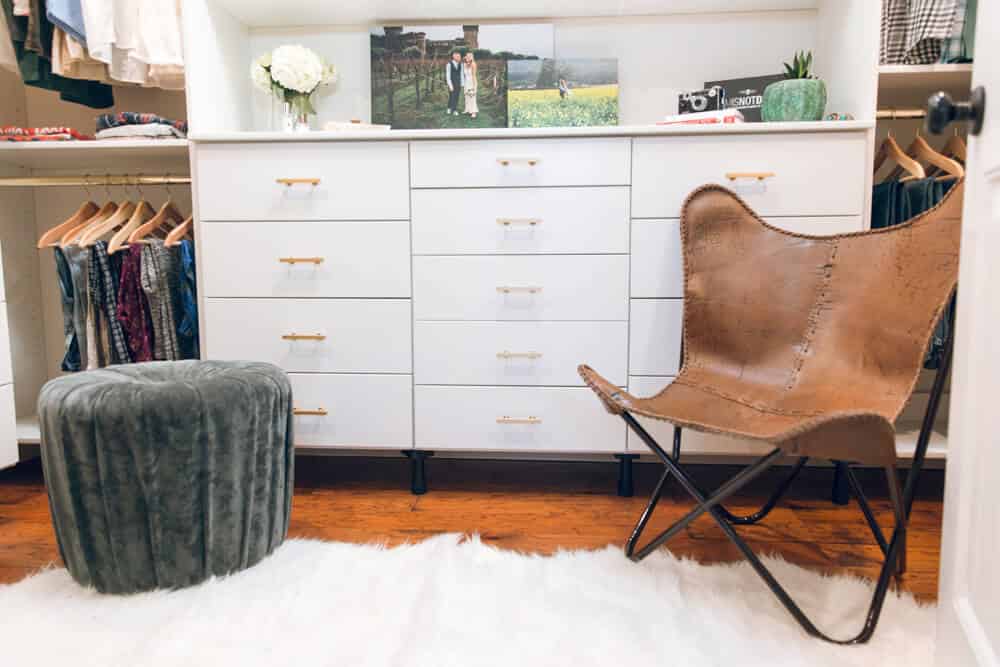 white closet with brown chair