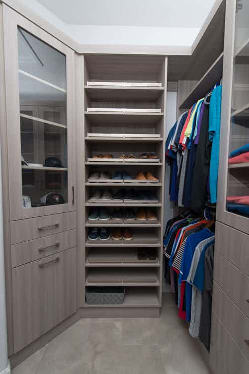 walk-in closet with shoe rack